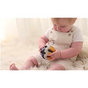 Piłka grzechotka dla niemowlaka TOLO Bio 3m+